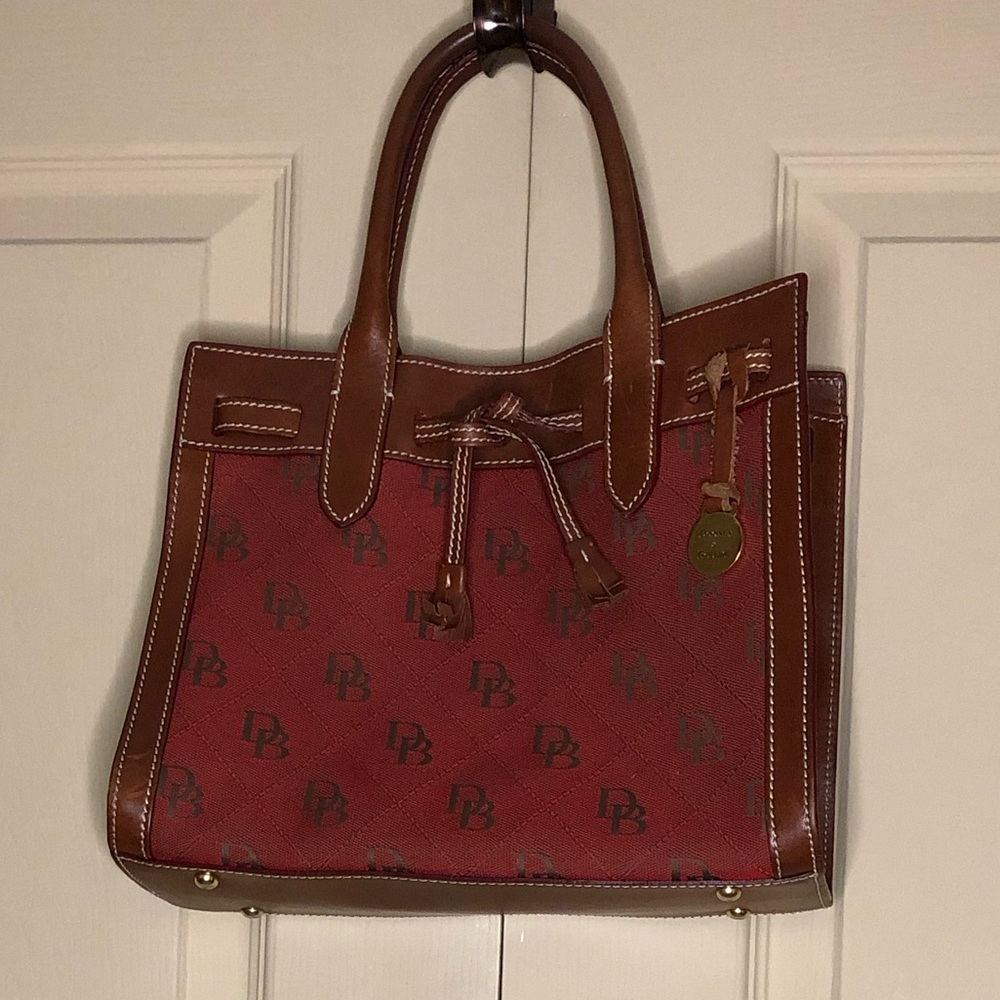 Dooney & Bourke purse with tassel and monogram